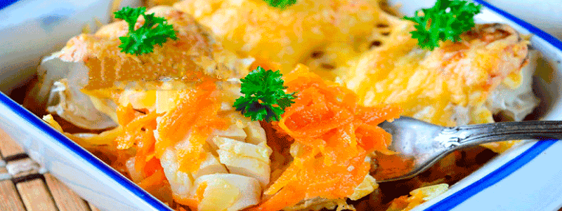 Минтай, запеченный в духовке с морковью и луком – подборка рецептов