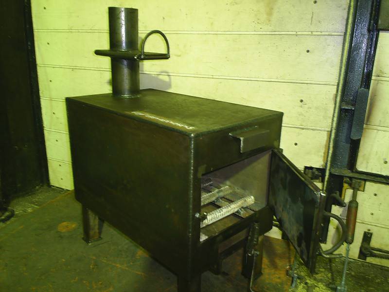 Как сделать для гаража печь из дерева или металла длительного горения своими руками, чертежи, инструменты и этапы работы