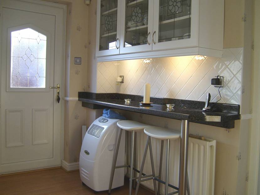 Дизайн кухонного помещения с барной стойкой трансформер